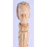 AN ANTIQUE CARVED IVORY PARASOL HANDLE. 14 cm long.