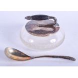 A 1920S SILVER PLATED GLASS CURLING STONE INKWELL. 9 cm wide. (2)