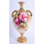 AN ANTIQUE ROYAL WORCESTER VASE by William Jarman. 23 cm high.