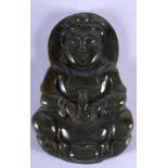 A CHINESE SPINICH JADE CARVED PLAQUE PENDANT, formin a seated Guanyin. 5.25 cm long.