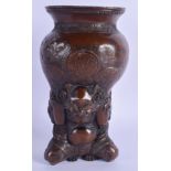 A 19TH CENTURY JAPANESE MEIJI PERIOD MIXED METAL VASE formed as oni aloft a vase. 16 cm x 6 cm.