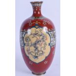 AN EARLY 20TH CENTURY JAPANESE MEIJI PERIOD CLOISONNE ENAMEL VASE decorated with dragons. 16 cm high