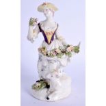 AN 18TH CENTURY BOW FIGURE OF A GIRL modelled sniffing a flower, after a Kaendler Meissen mode. 16 c