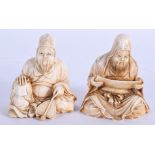 A PAIR OF 19TH CENTURY JAPANESE MEIJI PERIOD CARVED IVORY OKIMONO modelled seated. 5.5 cm x 6.5 cm.