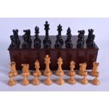 A VINTAGE BOXED TOURNAMENT SIZE WEIGHTED BOXWOOD AND EBONY CHESS SET Possibly Jacques or Staunton. L