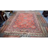 A HUGE ANTIQUE MIDDLE EASTERN PERSIAN CARPET together with two others. Largest 400 cm x 287 cm. (3)