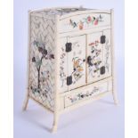 A GOOD 19TH CENTURY JAPANESE MEIJI PERIOD CARVED SHIBAYAMA IVORY CABINET decorated with foliage and