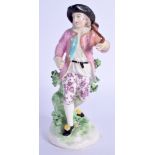 AN 18TH CENTURY DERBY FIGURE OF A VINTNER modelled carrying a barrel. 16 cm high.