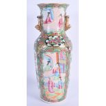 A 19TH CENTURY CHINESE CANTON FAMILLE ROSE VASE Qing. 26 cm high.