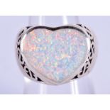 A SILVER AND OPAL HEART RING. N.