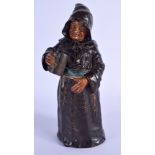 AN ANTIQUE AUSTRIAN TERRACOTTA MONK BELL modelled holding tankard. 29 cm high.