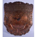 AN ARTS AND CRAFTS COPPER HANGING WALL CLOCK modelled in the Newlyn style, decorated with pecking he