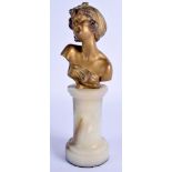 A FRENCH ART NOUVEAU GILT BRONZE FIGURE OF A PRETTY FEMALE modelled upon an onyx base. 25.5 cm high.