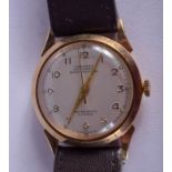 A 1950S YELLOW METAL ARISTEX WRISTWATCH. 3 cm diameter.