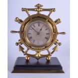 A RARE 19TH CENTURY INDUSTRIAL MARITIME SHIPS WHEEL CLOCK with silvered dial upon a black marble bas