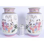 A LARGE PAIR OF CHINESE REPUBLICAN PERIOD FAMILLE ROSE VASES painted with figures within landscapes.
