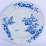 A LARGE 18TH CENTURY CHINESE BLUE AND WHITE CHARGER Yongzheng, painted with landscapes. 31 cm diamet