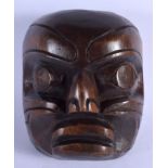 A VINTAGE NORTH AMERICAN HAIDA INUIT TRIBAL WOODEN MASK. 16 cm x 12 cm.