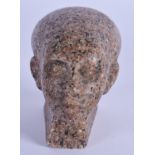 AN EGYPTIAN MIDDLE EASTERN CARVED GRANITE HEAD OF A PHAROAH. 7 cm x 6 cm.