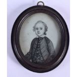 A FRAMED GEORGE III WATERCOLOUR PORTRAIT MINIATURE. Image 5 cm x 6 cm.