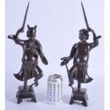 A VERY RARE PAIR OF 17TH CENTURY CHINESE BRONZE FIGURES OF STANDING IMMORTALS Ming, modelled as deit