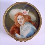 AN ANTIQUE IVORY INSET PORTRAIT MINIATURE depicting a female. 7 cm wide.