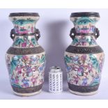 A LARGE PAIR OF 19TH CENTURY CHINESE FAMILLE ROSE CRACKLE GLAZED VASES painted with warriors within