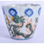 A CHINESE WUCAI PORCELAIN FACETTED BEAKER 20th Century, enamelled with dragons. 7 cm x 8 cm.