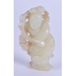 A 19TH CENTURY CHINESE CARVED GREEN JADE FIGURE OF A DANCING FEMALE modelled holding aloft a floral