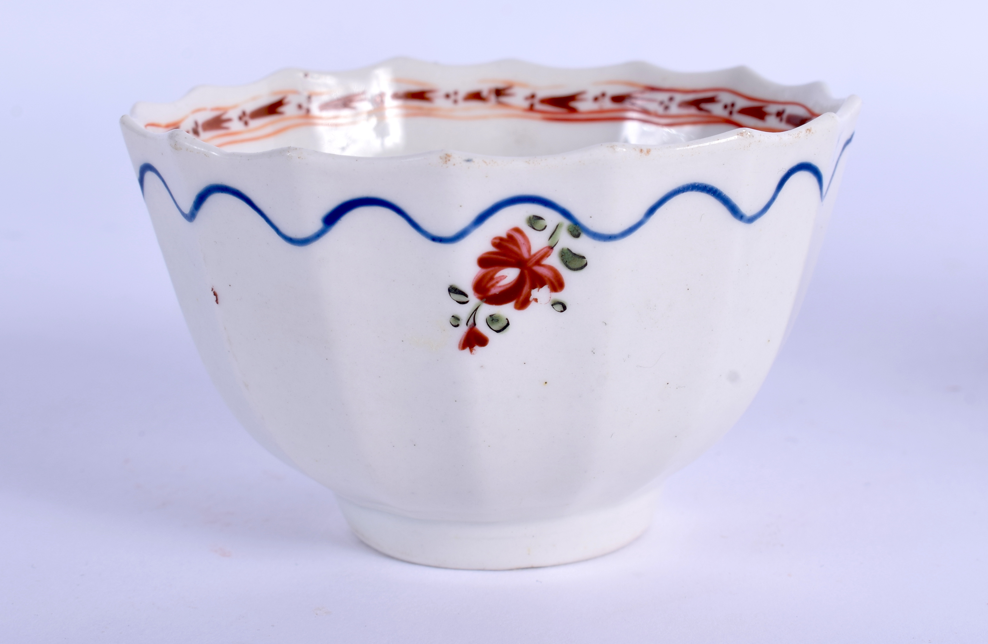 AN 18TH CENTURY LOWESTOFT TEABOWL AND SAUCER painted with central floral sprigs under an iron red bo - Image 2 of 3