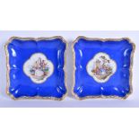 A PAIR OF 19TH CENTURY MEISSEN PORCELAIN SQUARE FORM DISHES painted with figures within landscapes.