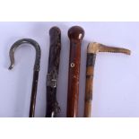 A LATE VICTORIAN ANTLER HANDLED RIDING CROP together with a silver mounted cane etc. Largest 90 cm l