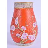 A RARE EARLY 20TH CENTURY CHINESE FAMILLE ROSE VASE bearing Qianlong marks to base, overlaid with fl