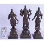 A RARE SET OF THREE 19TH CENTURY INDIAN BRONZE FIGURES OF BUDDHISTIC DEITY modelled upon square form
