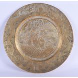 A 19TH CENTURY CHINESE POLISHED BRONZE CIRCULAR PLATE bearing Xuande marks to base. 27 cm diameter.