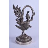 AN EARLY 20TH CENTURY THAI SILVER BUDDHISTIC FIGURE. 45 grams. 7.5 cm high.