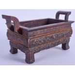 AN EARLY 20TH CENTURY CHINESE CARVED HARDWOOD CENSER Qing/Republic, decorated with dragons pursuing