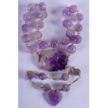 A 1930S CHINESE CARVED AMETHYST NECKLACE together with a similar bracelet. (2)