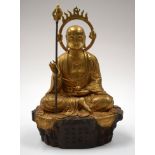 A CHINESE BRONZE BUDDHA. 30 cm x 16 cm.