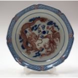 A CHINESE BLUE AND WHITE DRAGON PHOENIX DISH. 16 cm wide.