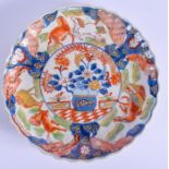 A 19TH CENTURY JAPANESE MEIJI PERIOD IMARI DISH painted with horse within landscapes. 24 cm wide.