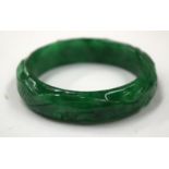 A CHINESE JADE BANGLE. 8 cm wide.