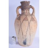 A LARGE CENTRAL ASIAN MIDDLE EASTERN TWIN HANDLED TERRACOTTA VASE painted to motifs. 60 cm x 24 cm.