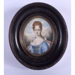 A 19TH CENTURY CONTINENTAL PAINTED IVORY PORTRAIT MINIATURE depicting a female within a landscape. I