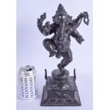 A LARGE 19TH CENTURY INDIAN BRONZE FIGURE OF GANESHA modelled standing upon one leg with arms extend