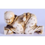 A 19TH CENTURY JAPANESE MEIJI PERIOD CARVED IVORY NETSUKE modelled as a scowling male with a mouse u