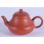 A FINE EARLY 19TH CENTURY IMPERIAL YIXING POTTERY TEAPOT AND COVER Jiaqing mark and period, of plain