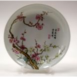 A CHINESE FAMILLE ROSE DISH. 18 cm diameter.