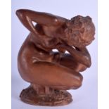 A LOVELY 19TH CENTURY FRENCH TERRACOTTA FIGURE OF A FEMALE modelled as a female squeezing her breast