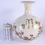 A CHINESE STUDIO POTTERY BULBOUS VASE 20th Century, painted with prunus. 28 cm x 15 cm.